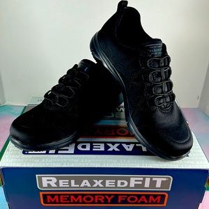 Women’s Skechers relaxed fit, slip resistant black shoes